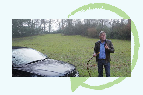 Tiff Needell stood with a car