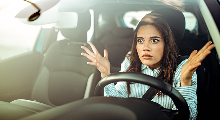 Person driving looking annoyed