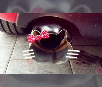 Car exhaust tip shaped like Hello Kitty with a pink bow